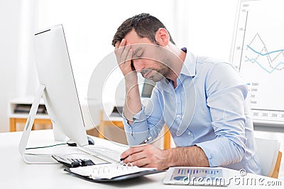 Young attractive business feeling pain because of burn out Stock Photo