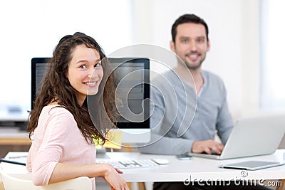 Young attractive co-worker at the office Stock Photo