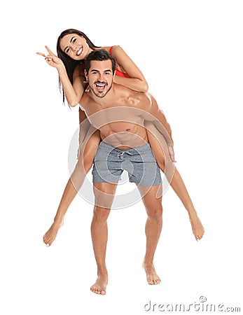 Young attractive couple in beachwear on white Stock Photo