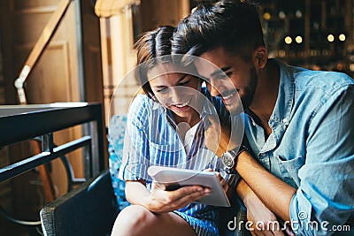 Young attractive couple on date in coffee shop Stock Photo