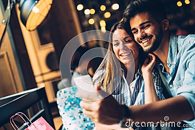 Young attractive couple on date in coffee shop Stock Photo