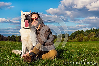 Young attractive girl with her pet dog Stock Photo