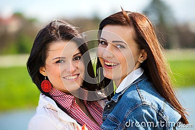 Young and attractive girlfriends have fun Stock Photo