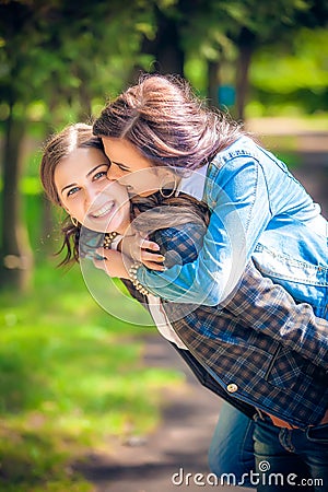 Young and attractive girlfriends have fun Stock Photo