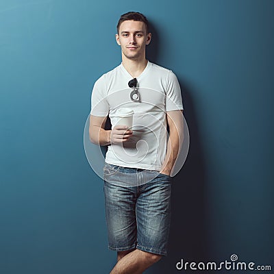 Young attractive handsome man in white t-shirt Stock Photo