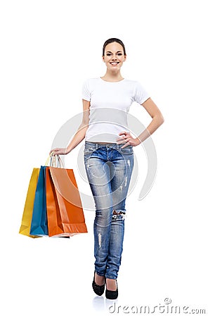 Young, attractive and happy shopping girl with bags Stock Photo