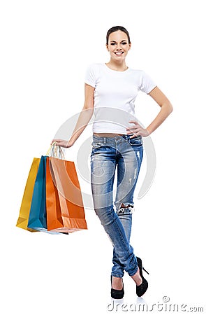 Young, attractive and happy woman with shopping bags Stock Photo