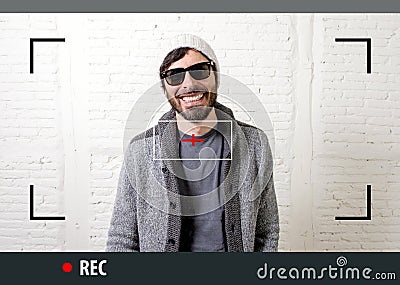 Young attractive hipster and trendy style man in selfie and internet video blogger recording Stock Photo