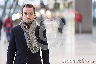 Young attractive man transiting a railway station Stock Photo