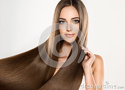 Young attractive model with long, straight,brown hair. Stock Photo