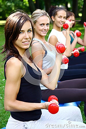 Young and attractive people doing fitness Stock Photo