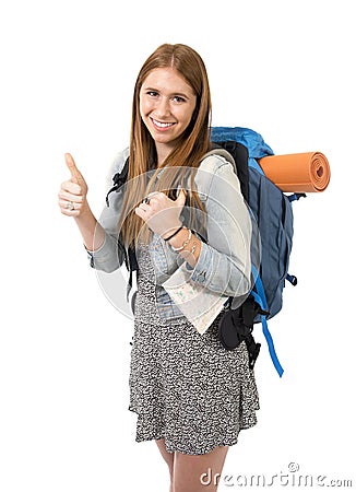 Young attractive tourist woman smiling happy carrying backpack and city map on holidays tourism concept Stock Photo