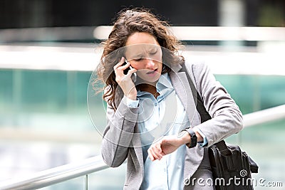 Young attractive woman being late to a rendez-vous Stock Photo