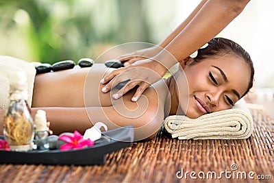 Young attractive woman enjoying in Asian massage Stock Photo
