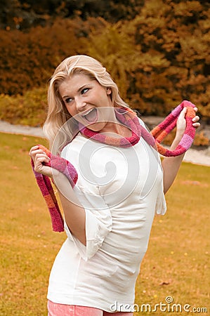 Young autumn woman in orange forest Stock Photo