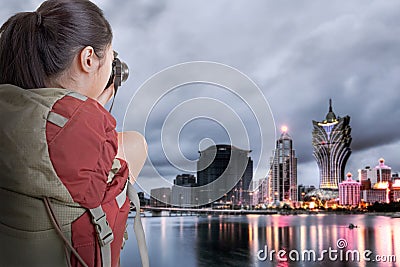 Young backpacker travel and take picture Stock Photo