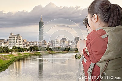 Young backpacker travel and take picture Stock Photo