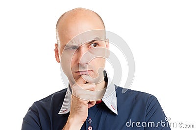 Young bald man doubting Stock Photo