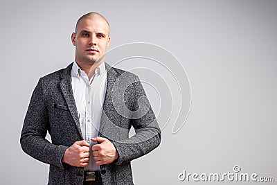 A young bald man in suit Stock Photo