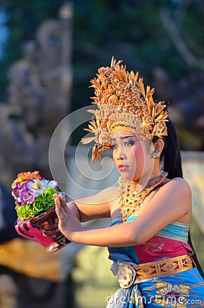 Young Balinese female dancer performing traditional dance Editorial Stock Photo