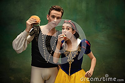 Young ballet dancers as a Snow White`s characters in forest modern tales Stock Photo