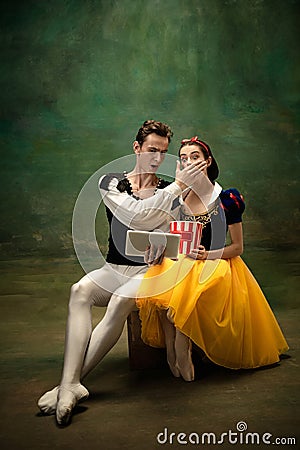 Young ballet dancers as a Snow White`s characters in forest modern tales Stock Photo