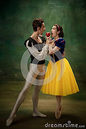 Young ballet dancers as a Snow White`s characters in forest modern tales Stock Photo