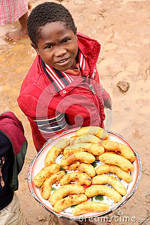 Young banana seller Editorial Stock Photo