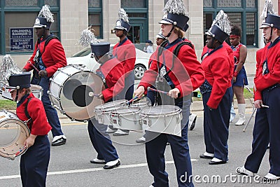 Young band members in a marching band in the Cherry Blossom Festival in Macon, GA Editorial Stock Photo