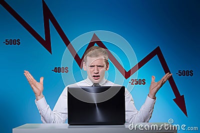 Young banker losing money Stock Photo