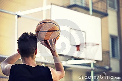 Young basketball player ready to shoot Stock Photo
