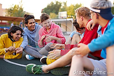 Young basketball players take a break Stock Photo