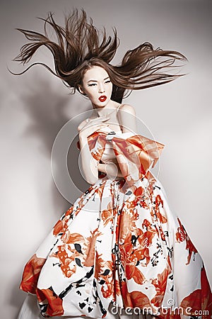 Young beautiful asian brunette, motion shot Stock Photo