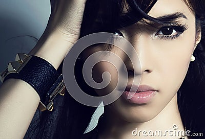 Young beautiful asian woman with flawless skin and perfect make-up and brown hair Stock Photo