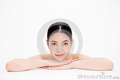 Young beautiful Asian woman with smooth and perfect skincare in white isolated background Stock Photo