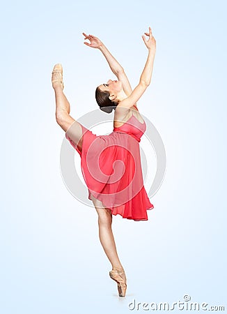 Young beautiful ballerina on a blu background Stock Photo