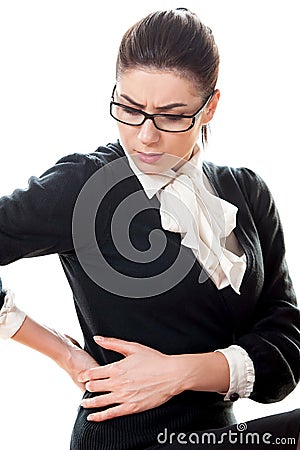 Young beautiful businesswoman having back pain Stock Photo