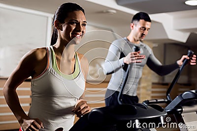 Young beautiful couple working out cardio training Stock Photo