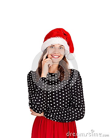 Young beautiful crazy woman in dress portrait. emotional girl in santa claus christmas hat isolated on white background. holiday c Stock Photo