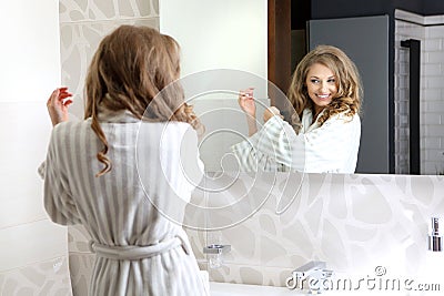 A young beautiful girl is combed Stock Photo