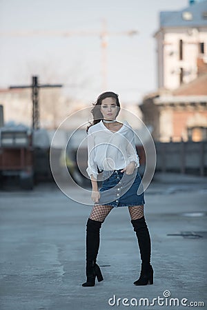 Young beautiful girl smiling on the street Stock Photo