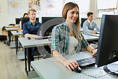 Young beautiful girl working on a computer Stock Photo