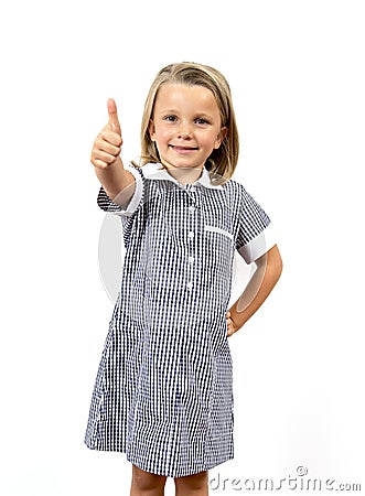 Young beautiful and happy child girl 6 to 8 years old blond hair and blue eyes smiling excited wearing school uniform isolated on Stock Photo