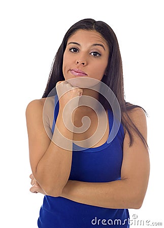 Young beautiful hispanic woman in casual top and jeans looking lost and confused Stock Photo