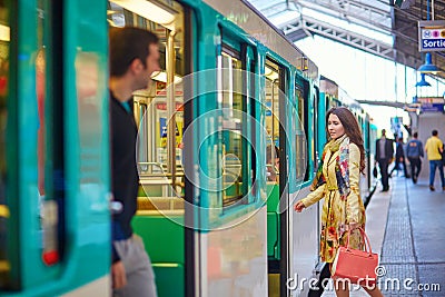 Young beautiful Parisian woman in subway Stock Photo