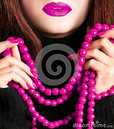 Young beautiful pretty young fashion model woman lady girl with bead necklace and pink makeup Stock Photo