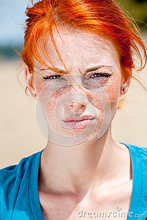 Young beautiful redhead freckled woman displeased Stock Photo