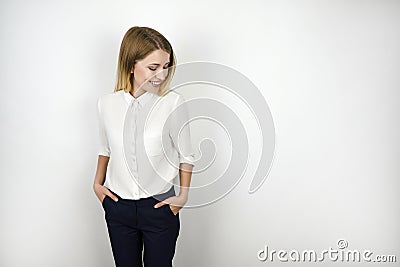 Young beautiful smiling blonde business woman after successful interview isolated white background Stock Photo