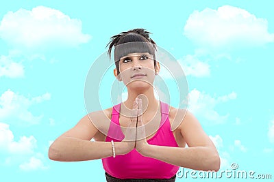 A young beautiful sporty girl meditates Stock Photo