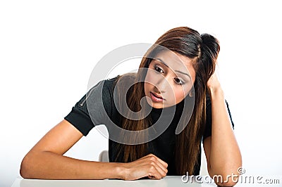 Young beautiful unhappy Asian Indian teenager Stock Photo